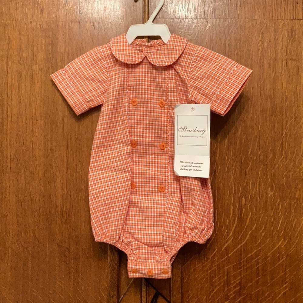 Strasburg burnt orange onesie. NWT
